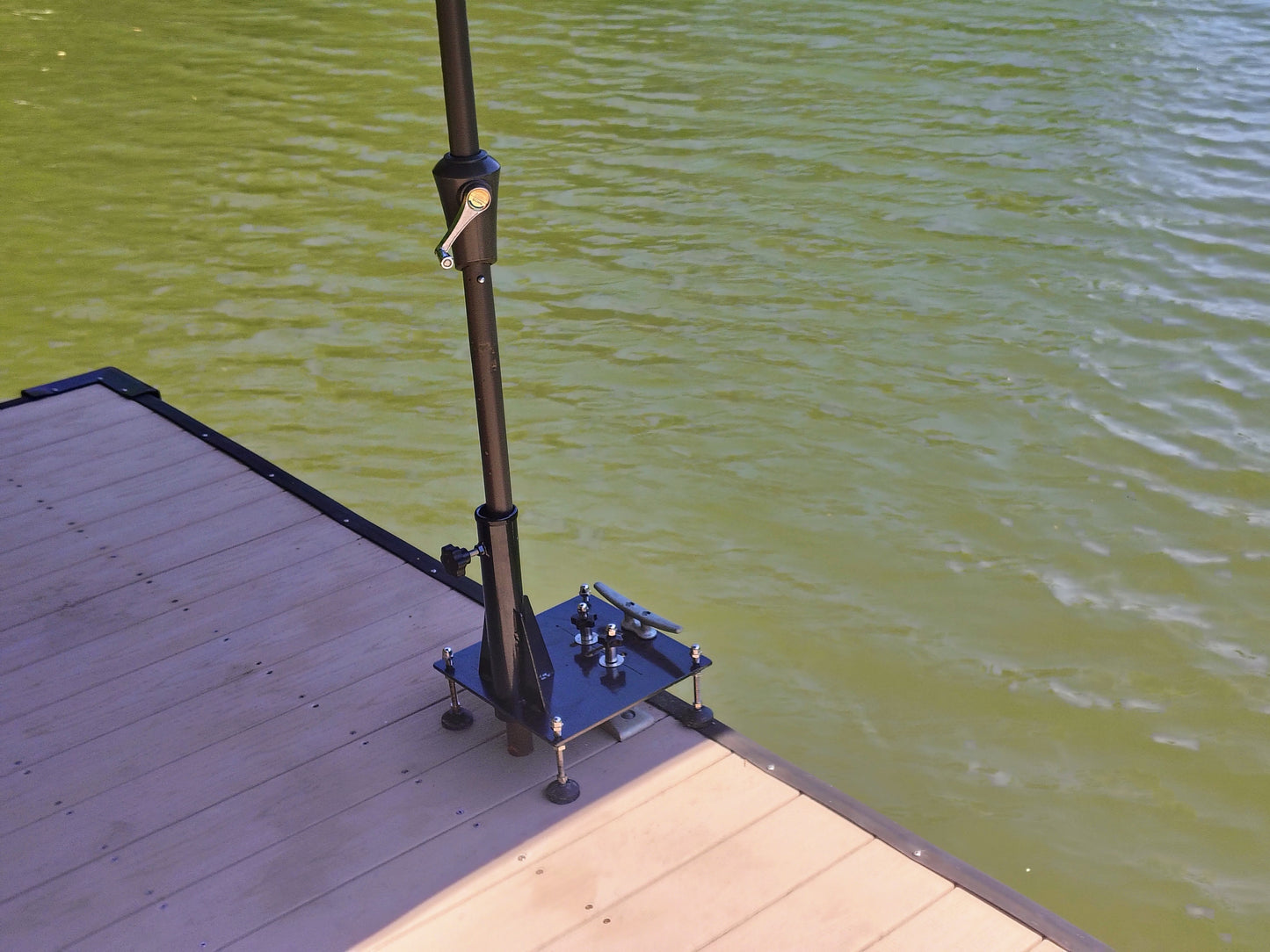 Cleat mounted umbrella and flag pole holder for docks and piers