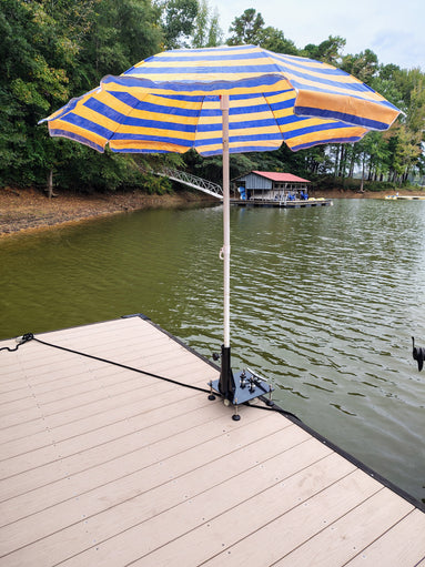 Cleat mounted umbrella and flag pole holder for docks and piers