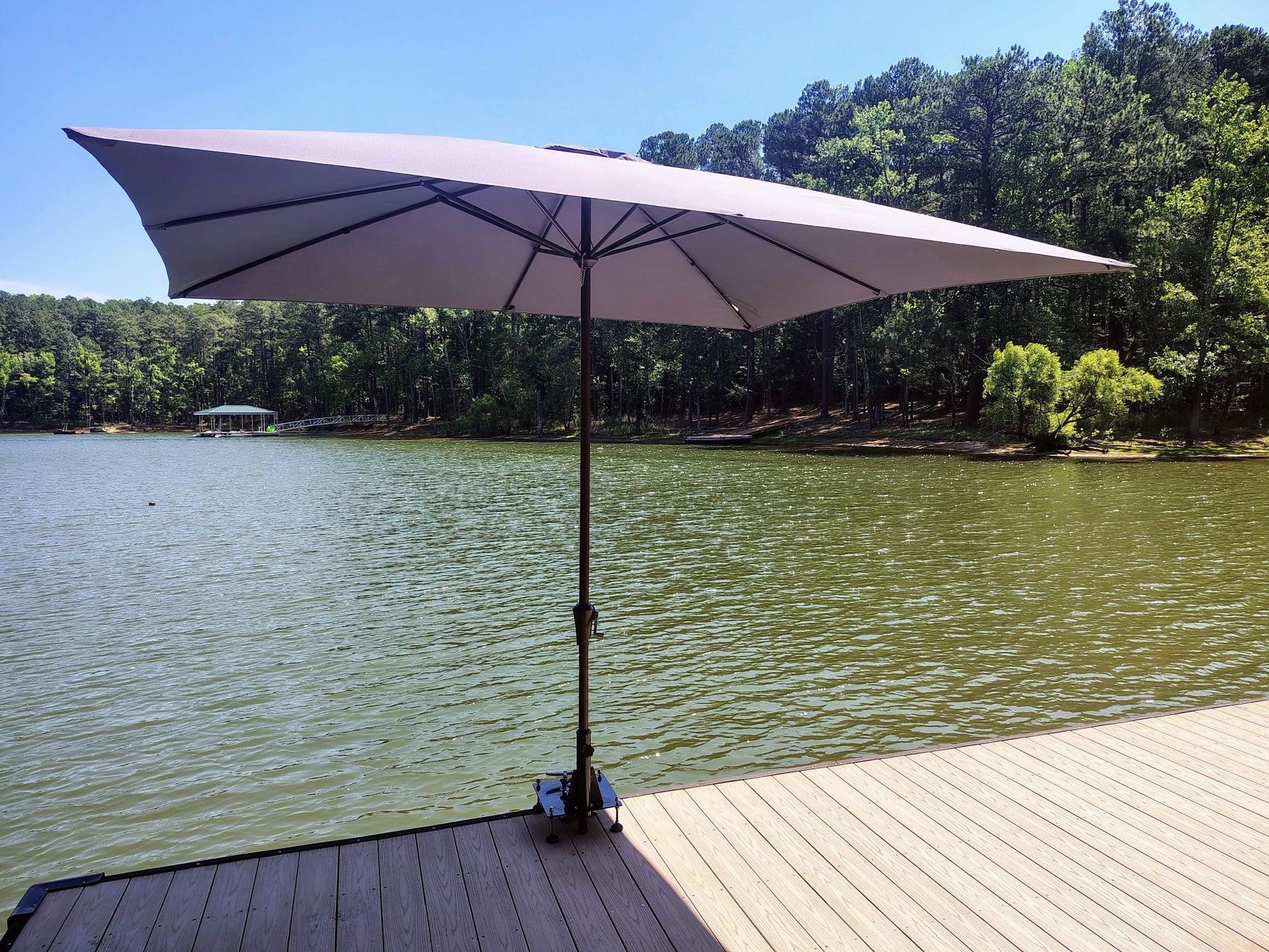 Cleat mounted umbrella and flag pole holder for docks and piers