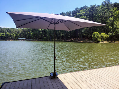 Cleat mounted umbrella and flag pole holder for docks and piers