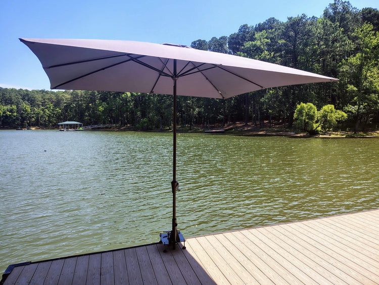 Cleat mounted umbrella and flag pole holder for docks and pier cleats