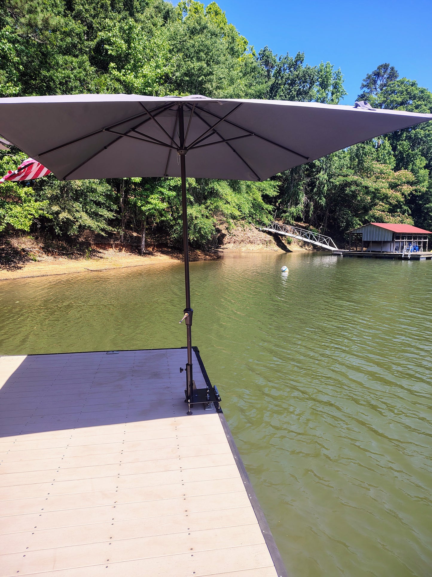 Cleat mounted umbrella and flag pole holder for docks and piers